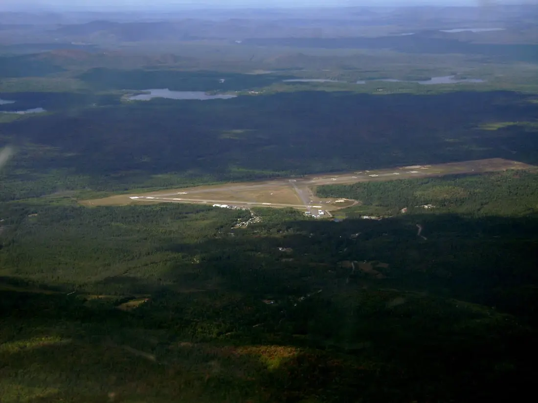 Adirondack Regional Airport at Lake Clear seen from the air, with the forest around it