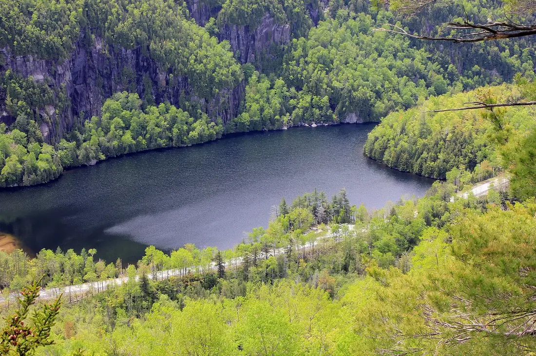 An Adirondack lake seen from a mountain trail above it
