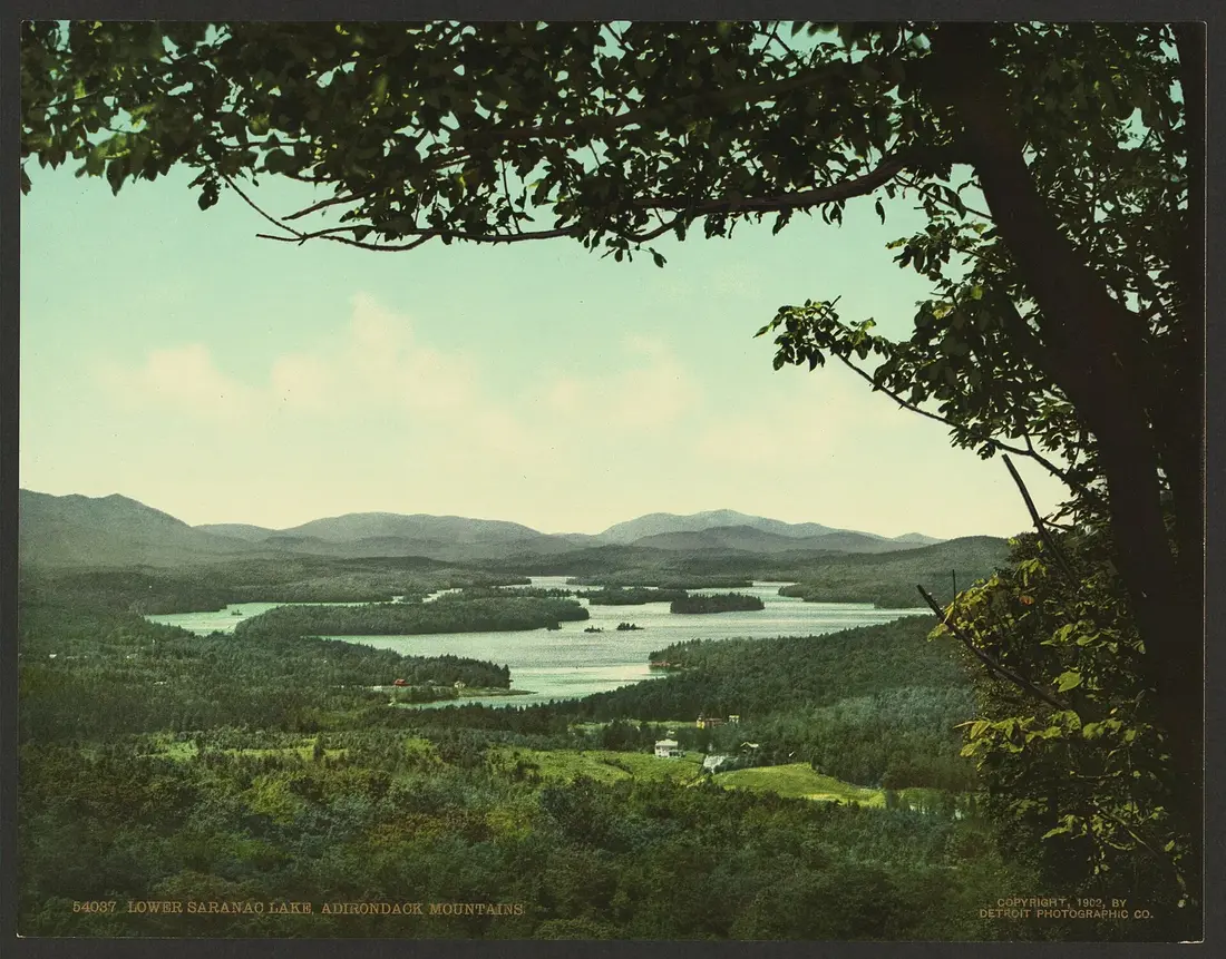 Lower Saranac Lake and the Adirondack hills in an early twentieth-century view