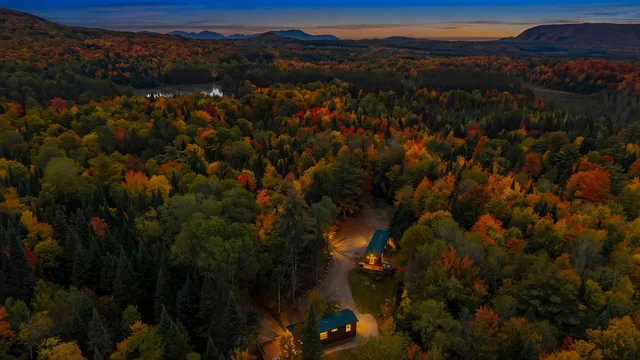The cabins' property at dusk, seen from the air