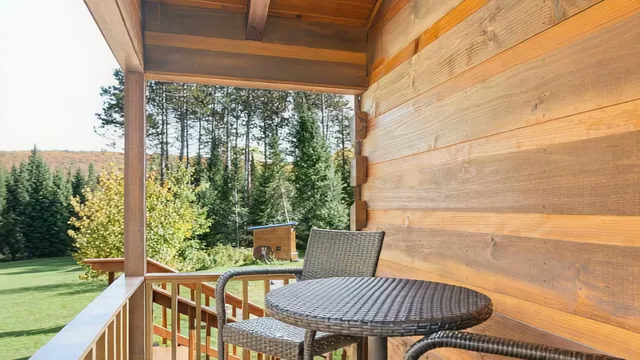 Table and chairs on The Modern Tiny Home's screened porch